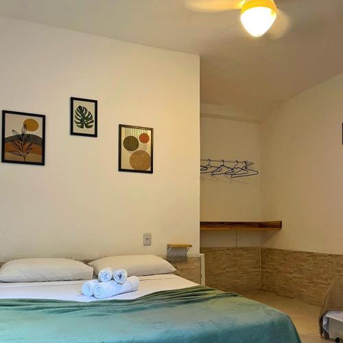 Ένα ή περισσότερα κρεβάτια σε δωμάτιο στο Pousada Nossa Senhora D'Ajuda