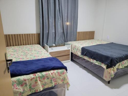 Ένα ή περισσότερα κρεβάτια σε δωμάτιο στο Apartamento Condomínio Lençóis Confort
