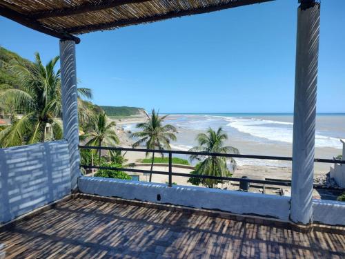 a view from the porch of the beach at blue BOCANA in Santa Cruz Huatulco