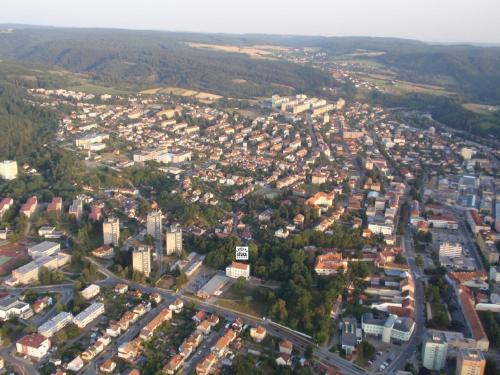 an aerial view of a city with many buildings at Hotel Zámecká Sýpka in Blansko