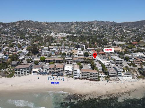 A bird's-eye view of Village District! Cleo Beach! 5 Min Walk to DTWN!