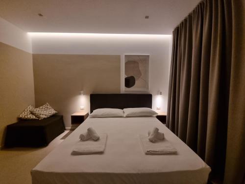 Katil atau katil-katil dalam bilik di Marea Retreat Rooms
