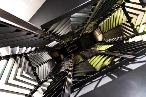 a ceiling of a building with a bunch of ties at Abrazo Sofia Hotel by HMG in Sofia