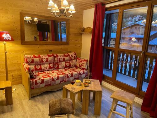 Uma área de estar em Appartement coeur de station Valfrejus 6 pers