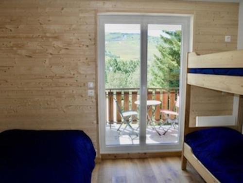 Postel nebo postele na pokoji v ubytování appartement ski au pied