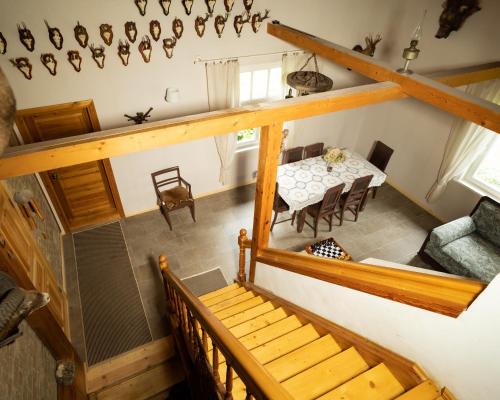 an overhead view of a house with a table and chairs at Avoti in Līgatne