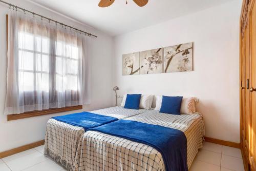 Postel nebo postele na pokoji v ubytování Puerto Chico U