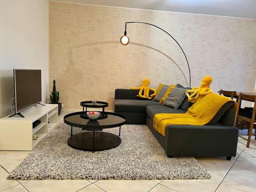 Area soggiorno di Comfy, cosy, and spacious apartment near Paris