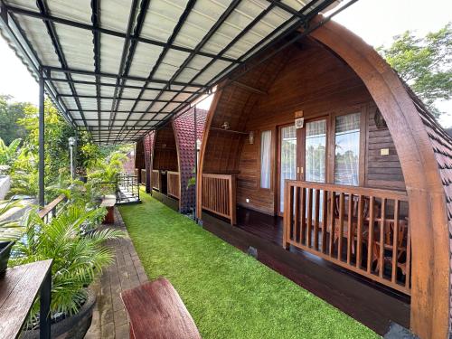 an outside view of a house with a porch at Dyou Villa in Nusa Penida