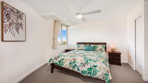 a bedroom with a bed and a window at Points North Unit 605 Kings Beach QLD in Caloundra