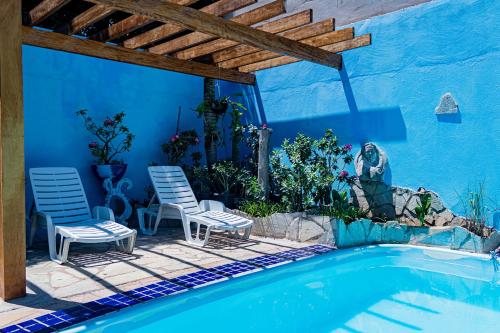 בריכת השחייה שנמצאת ב-Casa c ótima localização piscina e WiFi, Cuiabá או באזור