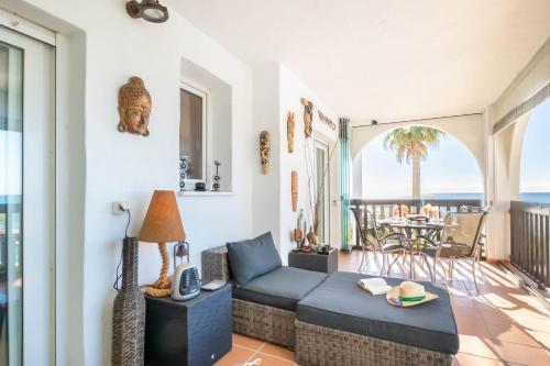 A seating area at Puerta del mar 2 - Happy Rentals