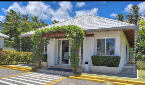 a building with a sign that reads hercules at Vista Mare Samana Amazing Views!! in Santa Bárbara de Samaná