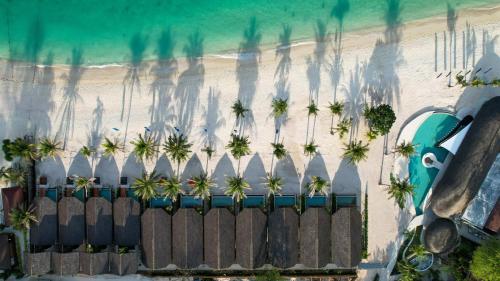 an overhead view of a beach with palm trees at Irene Pool Villa Resort, Koh Lipe in Ko Lipe