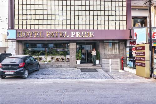 a man standing in the front of a hotel patrol pride at Clarks Inn Express Udaipur in Udaipur