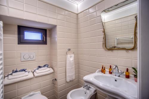 Un baño de Palazzo Stunis - Dimora di Charme