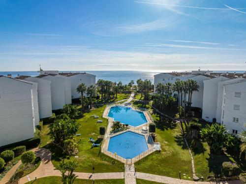 una vista aérea de un complejo con piscina en VACATION MARBELLA I Top 1 Puerto Banus Sea Front Rental, Near Marina en Marbella