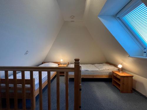 Posteľ alebo postele v izbe v ubytovaní Greggersen - Whg 1