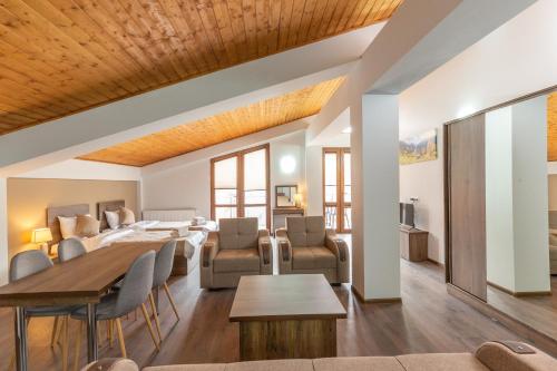 Posezení v ubytování Pine Chalets by KA Group
