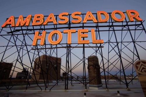 a sign that reads ambassador hotel on a metal structure at Ambassador Hotel Milwaukee, Trademark Collection by Wyndham in Milwaukee