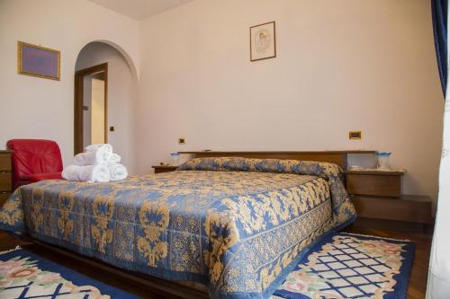 Posteľ alebo postele v izbe v ubytovaní B&B Nuovo Paradiso