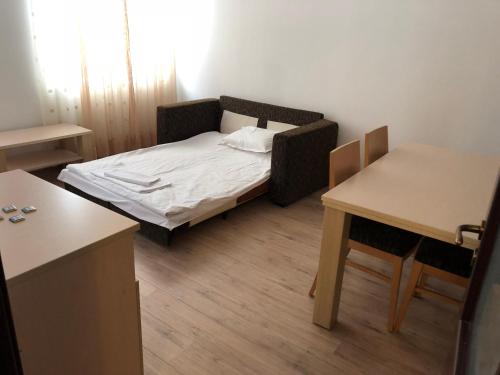 En eller flere senge i et værelse på Апартамент в хотел Стената, Пампорово