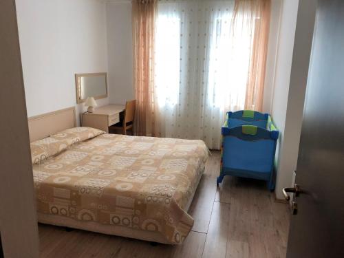 En eller flere senge i et værelse på Апартамент в хотел Стената, Пампорово