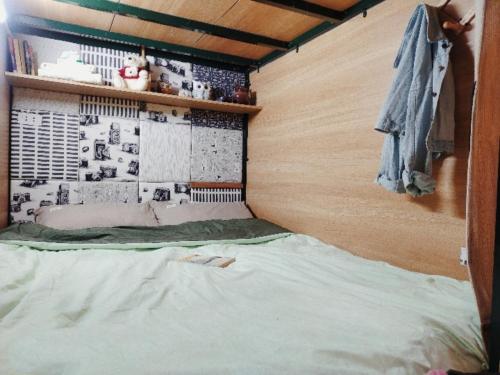 Postel nebo postele na pokoji v ubytování Auntie Liên's Homestay