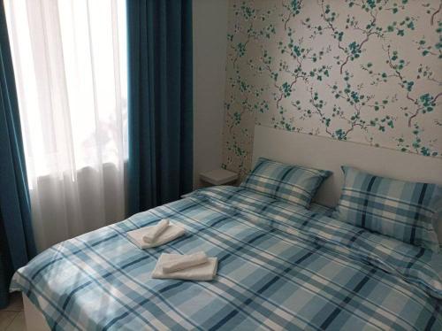 Giường trong phòng chung tại Katera