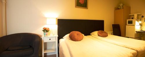 Postel nebo postele na pokoji v ubytování Euroway Hotel