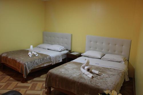 Postel nebo postele na pokoji v ubytování Hotel Caribe Azul