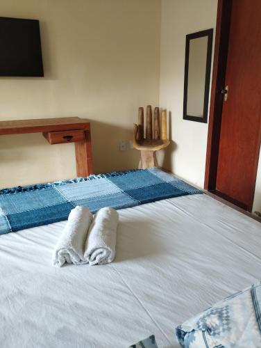 Postel nebo postele na pokoji v ubytování Andorinhas Suites