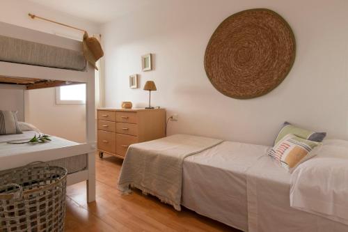 Postel nebo postele na pokoji v ubytování Apartamento Ponent 6