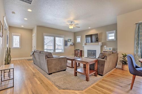 a living room with two chairs and a table at Charming Boise Home about 8 Mi to Downtown! in Boise