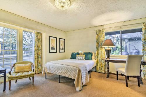 a bedroom with a bed and a desk and a piano at Spacious Hillsboro Home about 18 Mi to Portland! in Hillsboro