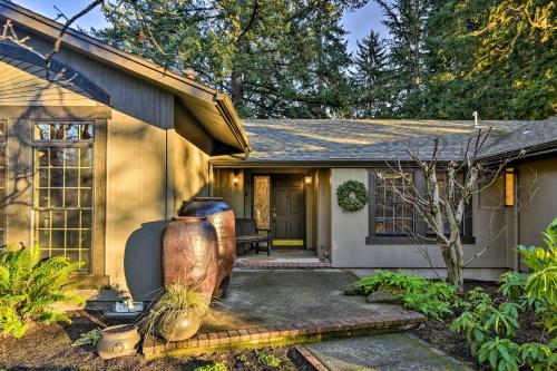 a house with a large vase sitting outside of it at Spacious Hillsboro Home about 18 Mi to Portland! in Hillsboro