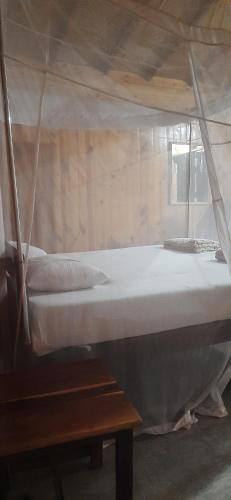 Katil atau katil-katil dalam bilik di Fernandes Bar and Restaurant