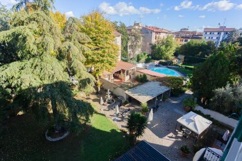 an aerial view of a house with a swimming pool at Villa Royal in Florence