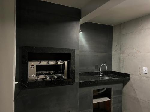 Dapur atau dapur kecil di Residencial Manauara Torres