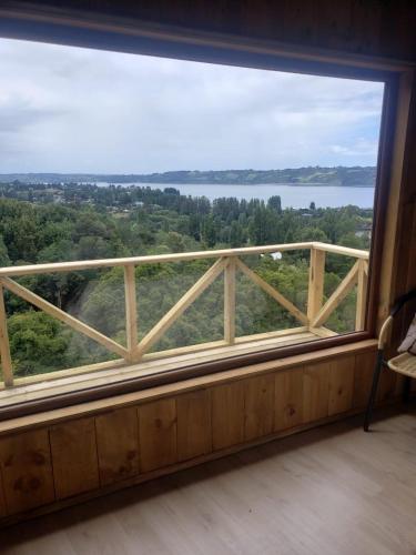 a large window in a room with a view at Cabañas Vasconia in Castro