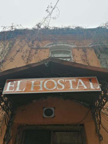 a sign that reads l hostel on top of a building at El Hostal in Tbilisi City