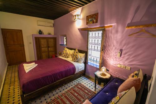 Postel nebo postele na pokoji v ubytování Riad Dar Hidaya Fes