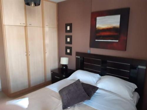 Posteľ alebo postele v izbe v ubytovaní Εclectic Apartment 8fr (free parking)