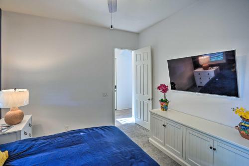 a bedroom with a bed and a tv on the wall at Private Pool and Spa Spacious Home in Bermuda Dunes in Bermuda Dunes
