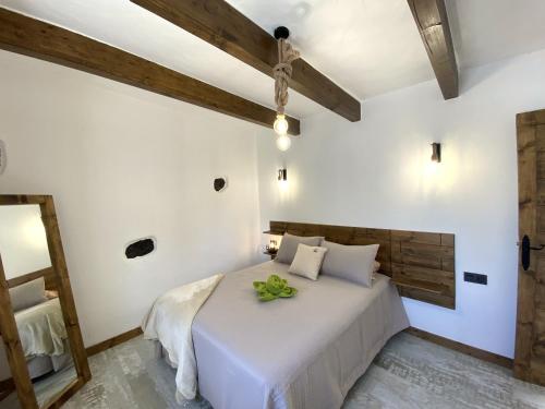 A bed or beds in a room at Ikigai