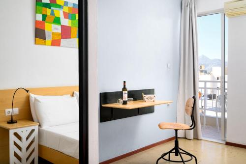 Postel nebo postele na pokoji v ubytování Crops Suites
