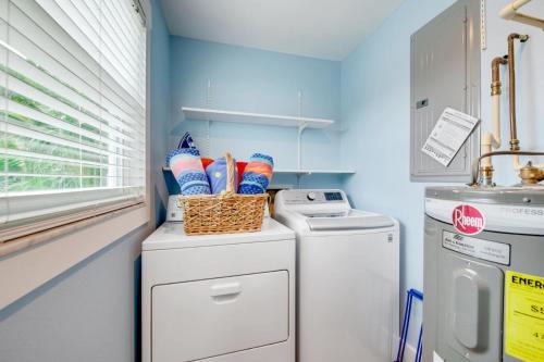 a laundry room with a washer and dryer at Found Your Sol Mate Gorgeous Home w Pool Spa Steps to Bean Point Dogs OK in Anna Maria