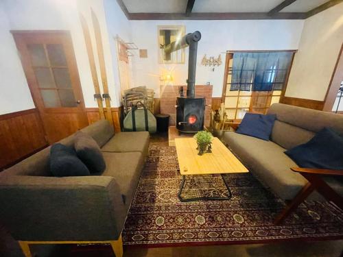 Posezení v ubytování GUEST HOUSE ZU-THONES HAKUBA