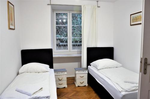 Krevet ili kreveti u jedinici u objektu Prudentia Apartments Brzozowa