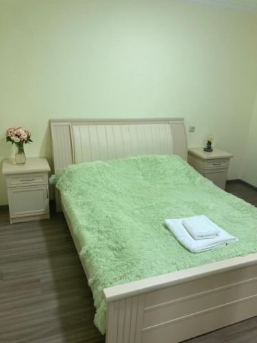 מיטה או מיטות בחדר ב-Armen’s Apartment